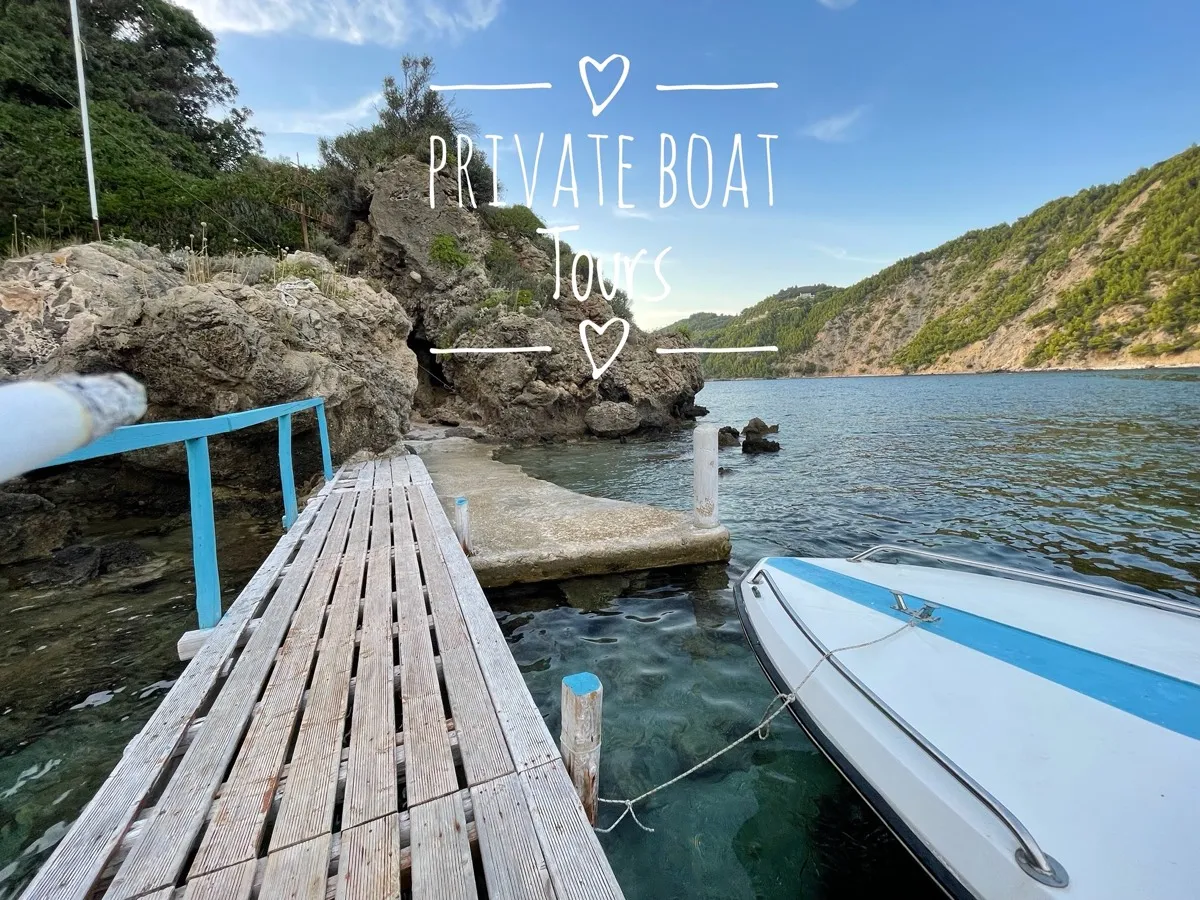 Couple enjoying romantic sunset private boat cruise Corfu